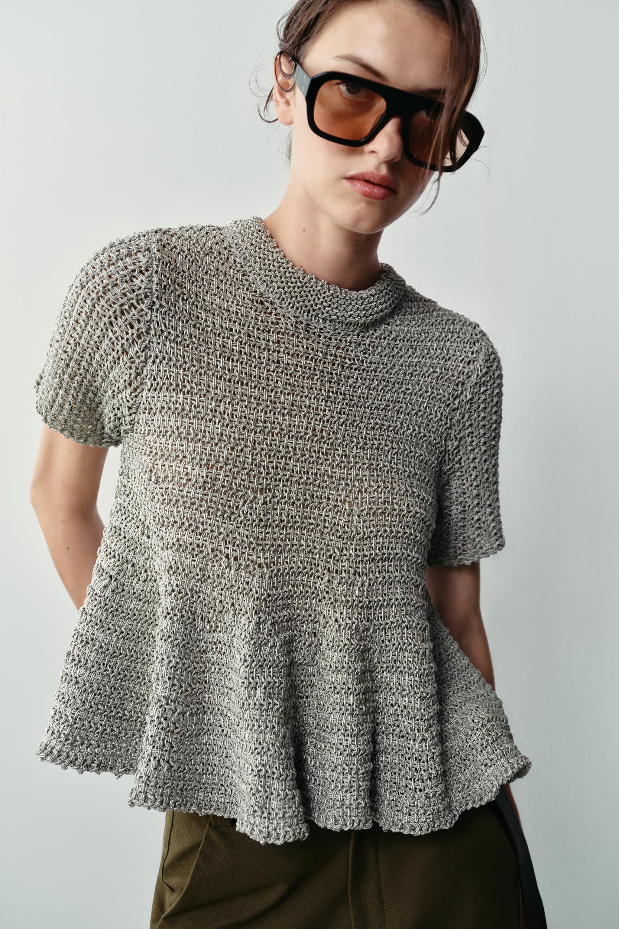 OPEN-KNIT PEPLUM TOP